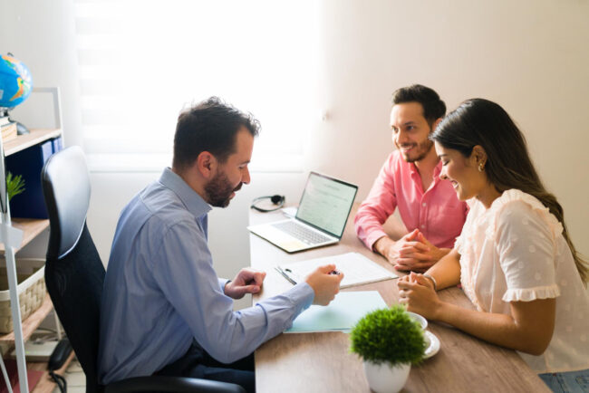 Insurance agent reviewing coverage gaps with underinsured California families