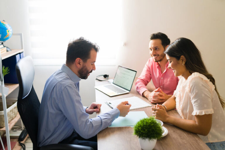 Insurance agent reviewing coverage gaps with underinsured California families