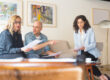 Homeowner reviewing homeowners insurance gaps with an agent
