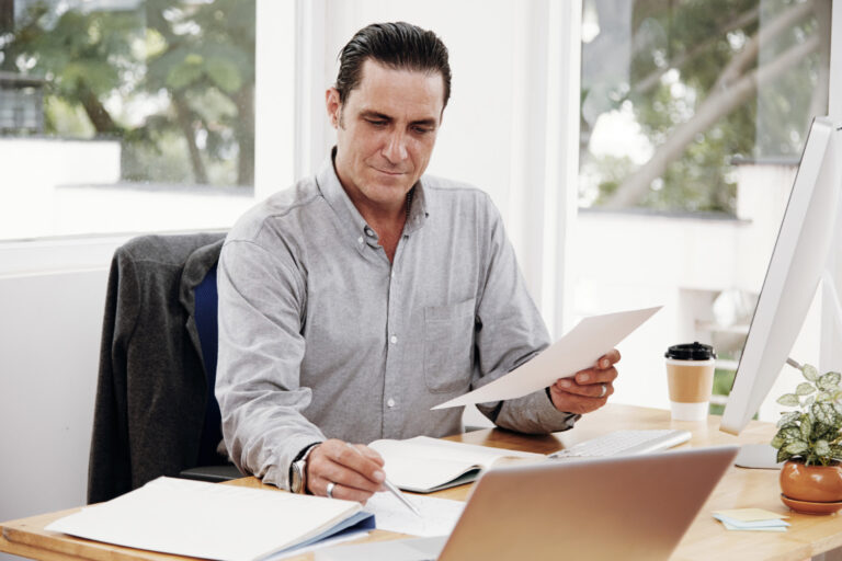 Business owner completing a yearly business insurance review