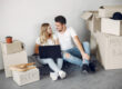 Homeowners reviewing insurance updates before moving to a new address