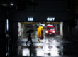 Business owner responding to premises liability risks after a parking lot slip